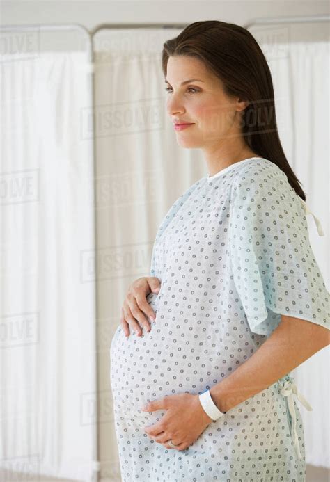 Pregnant Woman In Hospital Gown Stock Photo Dissolve