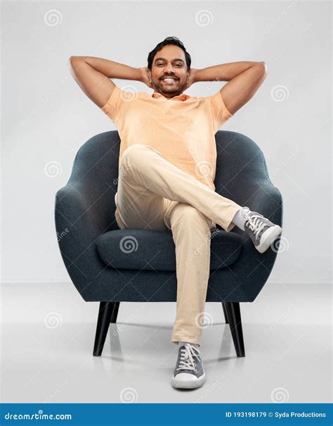 Happy Smiling Young Indian Man Sitting In Chair Stock Image Image Of