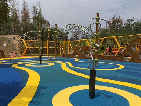 On the playground, various structures can. Miroad Rubber EPDM wetpour in a vibrant playground design ...