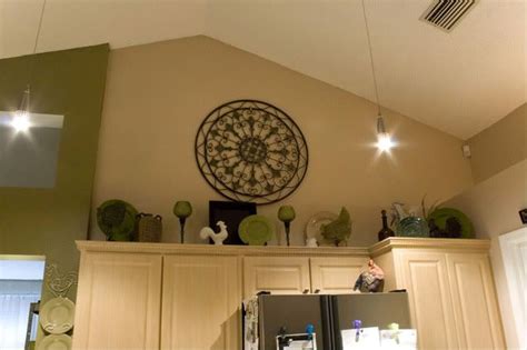 Decor pad i updated this post to add photos of my weirdo soffits, enjoy. kitchen cabinet top ideas--like the plates and birds ...