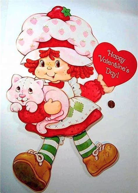 Strawberry Shortcake And Her Kitty Cat Custard As She Is Holding A Valentine S Day Card For