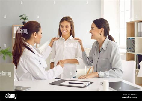 Mom And Daughter Visit Doctor In Clinic Stock Photo Alamy
