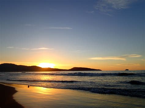 Безплатна снимка плаж море крайбрежие океан хоризонт облак небе слънце изгрев залез
