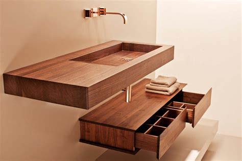 You know that you have a drop in sink when there is a lip that sits on the countertop. Best Choosing a Wooden Sink - TheyDesign.net - TheyDesign.net