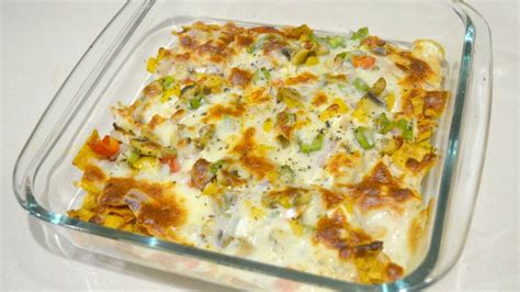 This loaded version of pizza nachos is layered with all the fixin's: Pizza Nachos | Easy Nachos Recipe | theitgirlbymj - YouTube