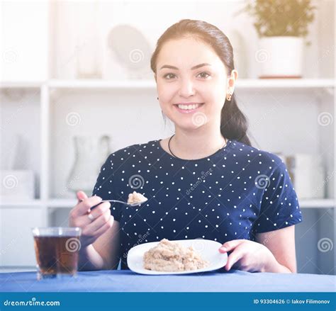 Smiling Girl Eating Cereal Stock Photo Image Of Losing 93304626