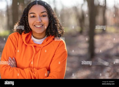 Outdoor Portrait Of Beautiful Happy Mixed Race Biracial African American Girl Teenager Female