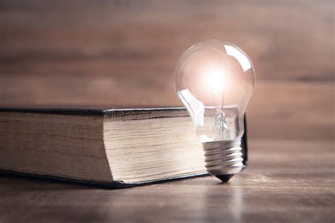 Light Bulb And Book Knowledge And Wisdom Stock Image Image Of