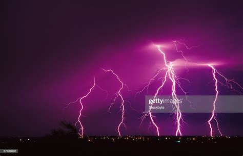 Infrared Shot Of A Bolt Of Lightning Hitting The Ground High Res Stock