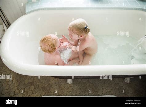 Siblings Bathing Together Hi Res Stock Photography And Images Alamy