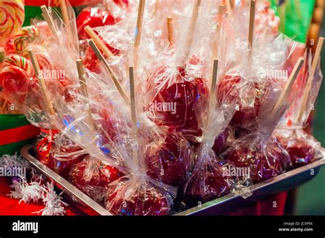 Sweet Glazed Red Toffee Candy Apples On Sticks For Sale On Farmer