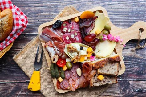 Charcuterie And Cheese On Wooden Board Antipasti Assortment Cold Cut