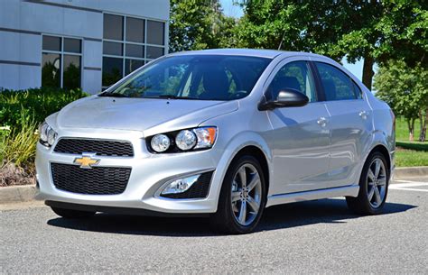 Available driver assistance features include rear parking sensors, lane departure warning. 2014 Chevrolet Sonic RS 6-Speed Manual Review & Test Drive