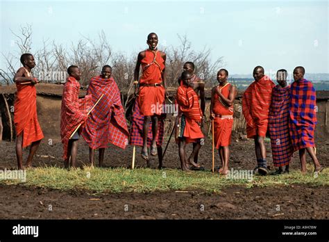 A Group Of Masai Men Doing A Traditional Dance In Their Village Called