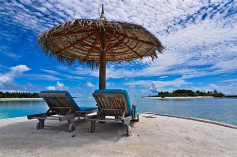 Beachchair With Umbrella Maldives Yosika Happyholidaytravel