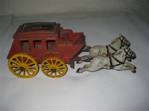 Antique Wells Fargo Cast Iron Western Stage Coach Toy Horse Drawn