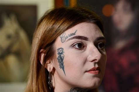 Woman Tattoos Face To Prevent Herself From Getting Normal Job Daily