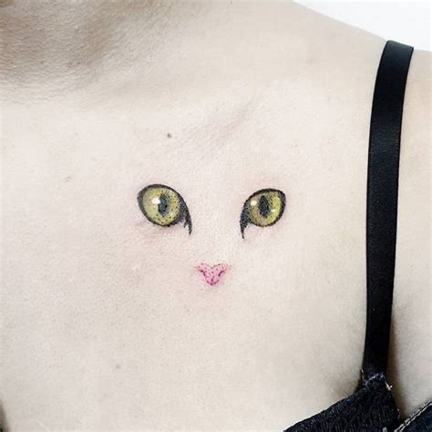 Minimalist Cat Tattoo On The Chest