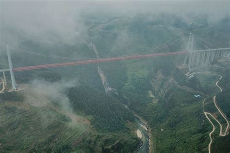 Fog Shrouded Qingshuihe Bridge In Southwest Chinas Guizhou