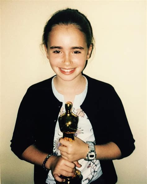Little Lilly With Her Dad’s Oscar Lily Collins Lilly Collins Lily