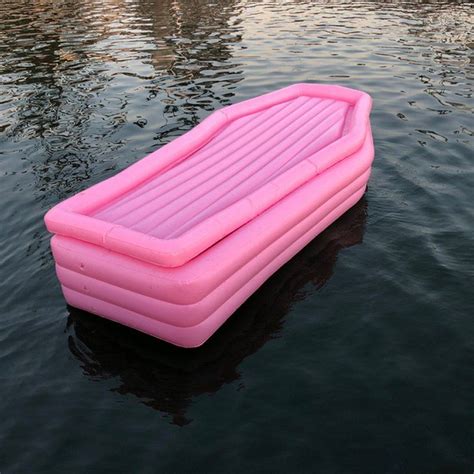 Bury Yourself This Summer In This Pink Coffin Pool Float Pink Coffin