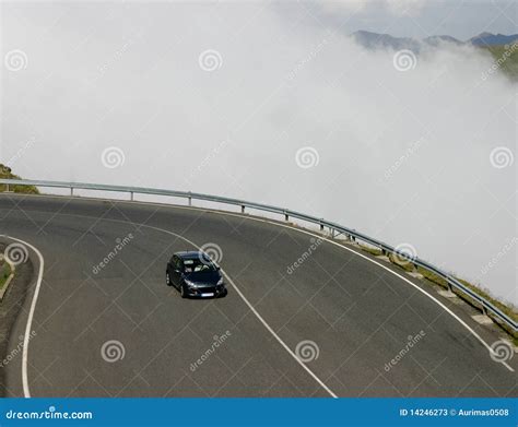 Lonely Car On A Mountain Road Stock Photos Image 14246273