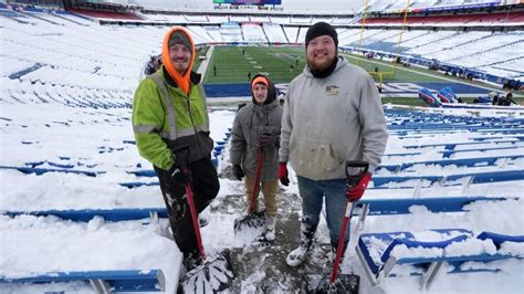 Buffalo Bills Fans Work Hard And Play Hard While Shovelling Snow At
