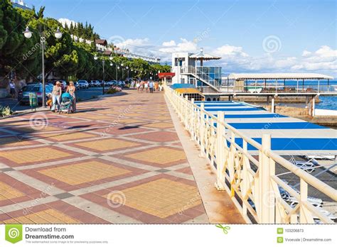 Visitors Walk On Embankment In Alushta City Editorial Stock Photo