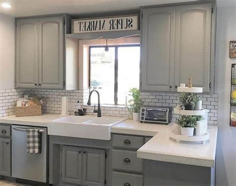 Gray kitchen cabinets provide a gorgeous neutral tone that's easy to match with other elements in traditional kitchen cabinets are ornamental in addition to functional, with beveling and either raised stained cabinets are great for classic or farmhouse style rooms. Easy Design for Farmhouse Gray Kitchen Cabinets Ideas