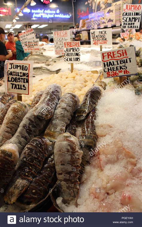 Seafood Displayed At Pike Place Fish Co At Pike Place Market In