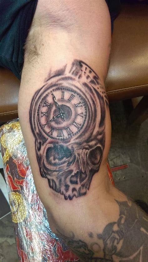 Great Skull Clock Arm Tattoo
