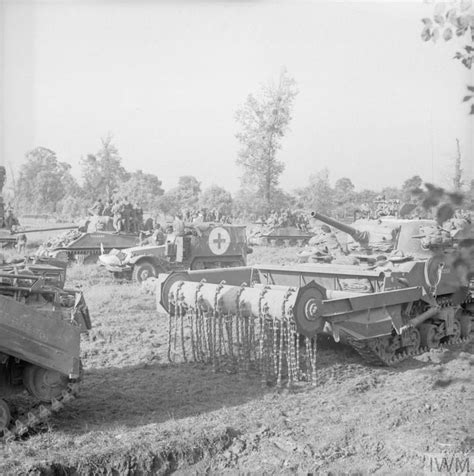 Sherman Tanks Caryying Infantry A Sherman Crab Flail Tank And An