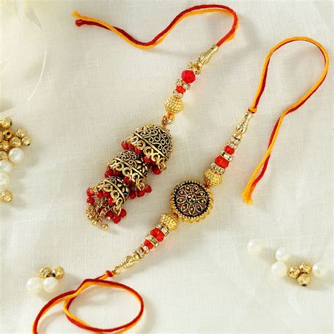 Bhaiya Bhabhi Rakhi Designed With Metal Jaal Work With Red Beads Gift