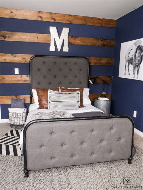 Rustic farmhouse boy bedroom, teen boy room with map and hockey stick and vintage bedding boys. Rustic Navy Blue Boys Room Decor - Taryn Whiteaker