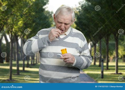 Portrait Of Old Man Taking Pills Stock Image Image Of Capsule