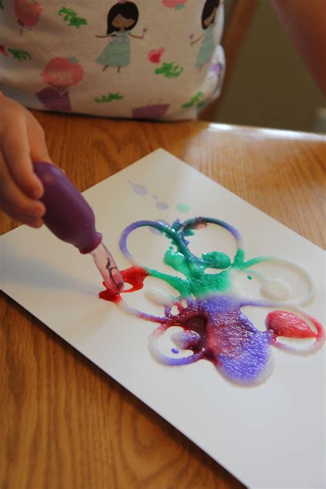 For this activity that's up next on our list of science activities for toddlers and preschoolers you will need a few things like baking soda, watercolors (you can also use food coloring), dish soap, vinegar, glitter, a glass jar, and a tray. Toddler Approved!: 7 Favorite Toddler Science Activities