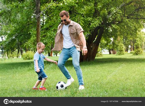 Father Son Having Fun Playing Football Park Stock Photo By