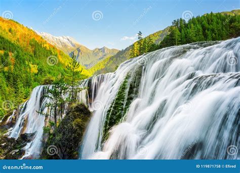 Amazing View Of The Pearl Shoals Waterfall Among Woods At Sunset Stock