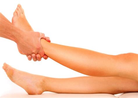 Premium Photo A Physio Therapist Giving A Leg Massage Over White