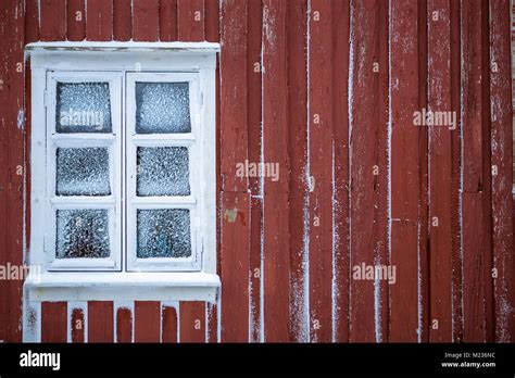 Traditional Red Rorbu Cabins In Winter Reine Moskenesøy Lofoten