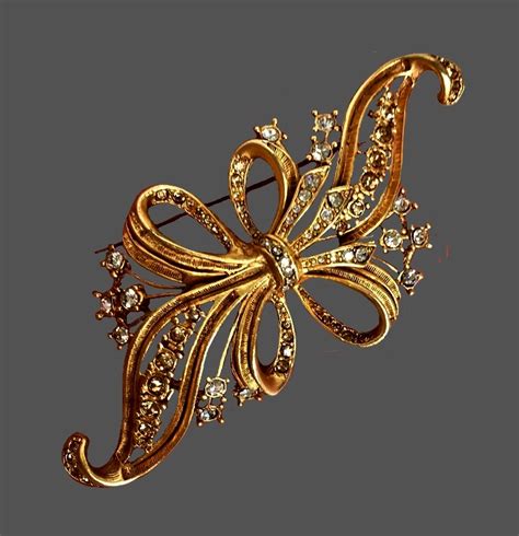 Elegant Bow Brooch Of Gold Tone Decorated With Crystals Cm Kaleidoscope Effect