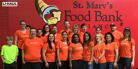 Volunteers are the heartbeat of smfb. U-Haul Team Members Pack Food for the Hungry at St. Marys ...