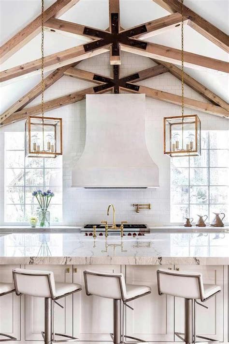 They add dramatic vertical space: White Classic Kitchen Design With Vaulted Ceiling And ...