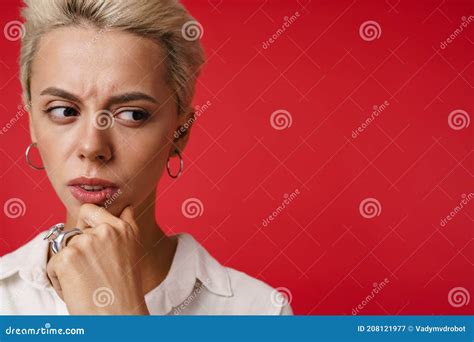 Brooding Beautiful Blonde Girl Posing And Looking Aside Stock Image