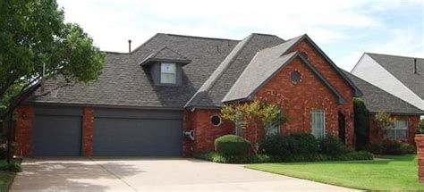 My original thought was gray siding. A collection of red brick houses with different colored ...