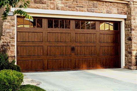 Attach the faux garage door windows to garage door panel with the stainless steel screws. gallery walnut with light panels | Wood garage doors, Faux ...