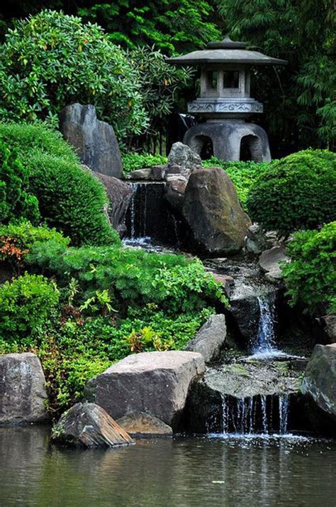 Stone Japanese Lantern Highlights This Backyard Pool With Waterfall