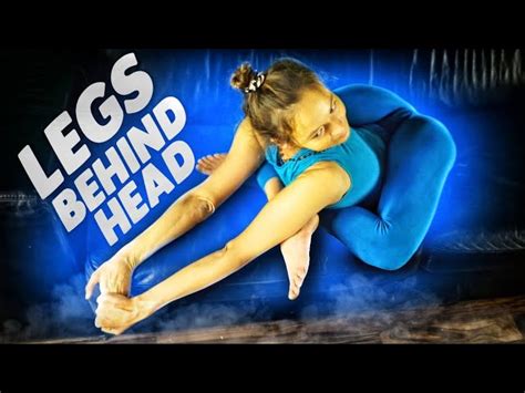 feet behind head yoga pose