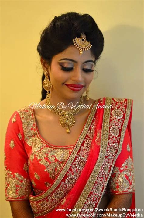 With a flurry of decisions to make before your special day, wedding preparations can feel a bit hectic, but don't fret; Indian bride Keerthi wears bridal lehenga and jewelry for her Reception. Makeup and hairstyle by ...