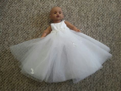 There has been a lot of work going into this lately. Repurposed wedding dress into an angel gown for sweet send ...